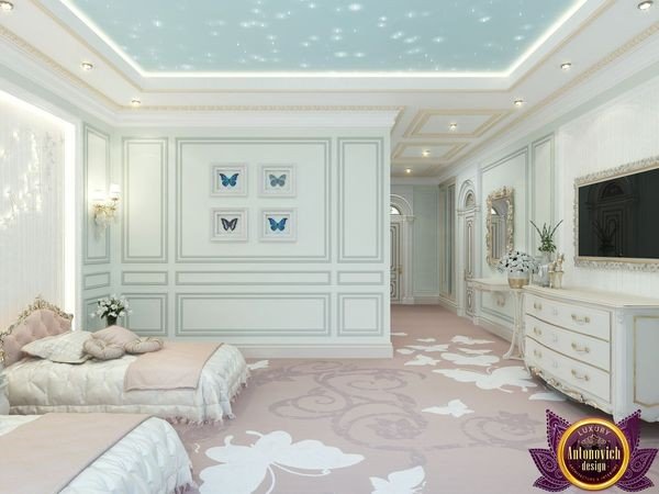 Elegant pink and white themed girl's room with canopy bed